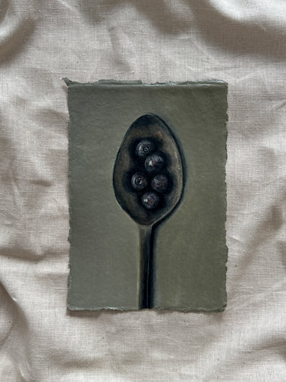 spoon of blueberries