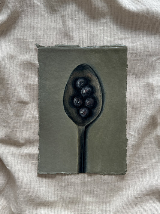 spoon of blueberries