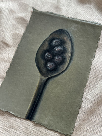 spoon of blueberries